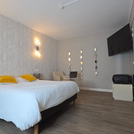 Logis Arcombelle Hotel Montigny le Roi Bagian luar foto