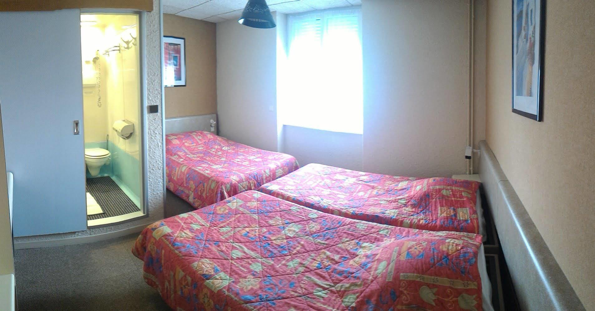 Logis Arcombelle Hotel Montigny le Roi Bagian luar foto