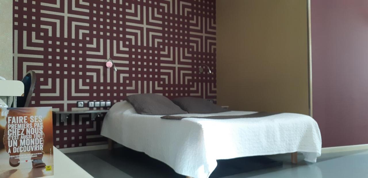 Logis Arcombelle Hotel Montigny le Roi Bagian luar foto